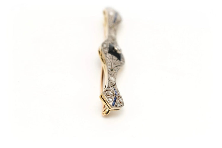 Broche Art Déco en or jaune et blanc, onyx, saphirs et diamants 58 Facettes 23114