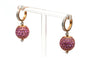 Boucles d'oreilles contemporaines en or rose, saphirs roses et diamants 58 Facettes 23540