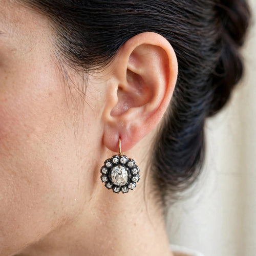vintage_rosette_earring_closeup.webp