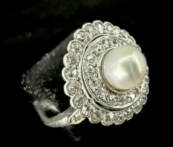 55 Art nouveau - Bague en platine, perle fine et diamants 58 Facettes Bague 23