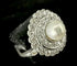 55 Art nouveau - Bague en platine, perle fine et diamants 58 Facettes Bague 23