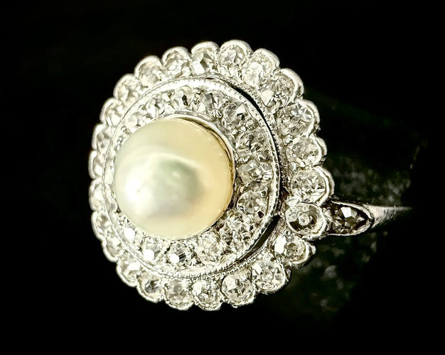55 Art nouveau - Bague en platine, perle fine et diamants 58 Facettes Bague 23