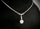 Collier ancien en or gris et diamants 58 Facettes Collier 010