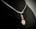 Collier ancien en or gris et diamants 58 Facettes Collier 010