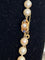 Collier choker en or 18K, perles Akoya et saphirs 58 Facettes 000