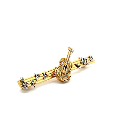 Broche guitare en or jaune et blanc avec diamants 58 Facettes 50494