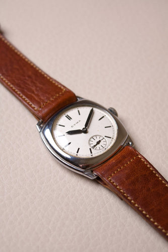 Cyma - Montre coussin en acier, cadran blanc, années 1940 58 Facettes MONTRE-019