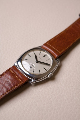 Cyma - Montre coussin en acier, cadran blanc, années 1940 58 Facettes MONTRE-019