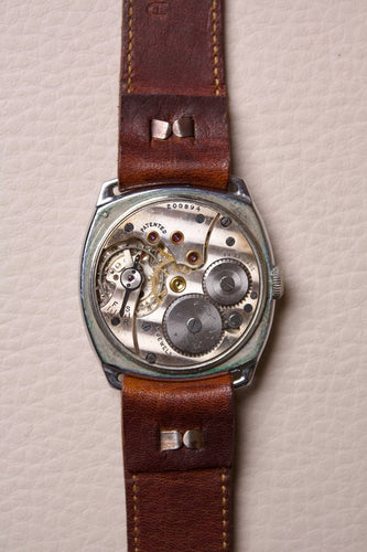 Cyma - Montre coussin en acier, cadran blanc, années 1940 58 Facettes MONTRE-019