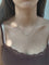 Collier en or rose et jaune, émeraude et diamants 58 Facettes 1809877