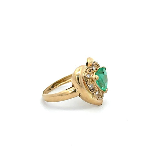 52 Bague cœur en or jaune, émeraude colombienne et diamants 58 Facettes 50500