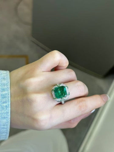 Bague 50 Bague en émeraude de Zambie, diamants et grenats tsavorites 58 Facettes jnci157