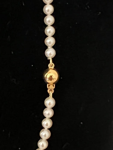 Collier choker en or jaune 18K et perles de culture 58 Facettes 952