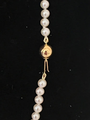 Collier choker en or jaune 18K et perles de culture 58 Facettes 952