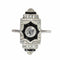 50 Art déco - Bague en or blanc, diamants et onyx 58 Facettes 26089-0350