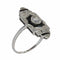 50 Art déco - Bague en or blanc, diamants et onyx 58 Facettes 26089-0350