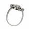 50 Art déco - Bague en or blanc, diamants et onyx 58 Facettes 26089-0350