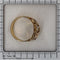 61 Bague triple serpent en or jaune, rubis, saphir et diamant 58 Facettes 26106-0234