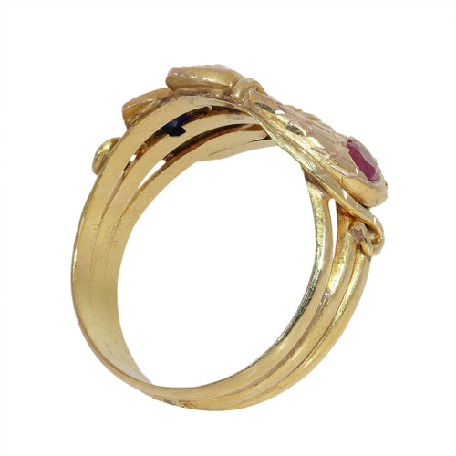 61 Bague triple serpent en or jaune, rubis, saphir et diamant 58 Facettes 26106-0234