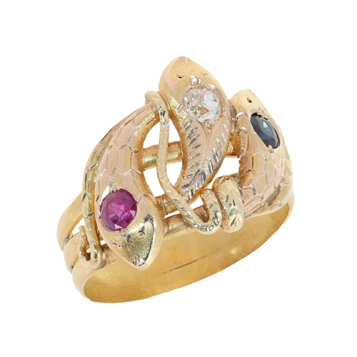 61 Bague triple serpent en or jaune, rubis, saphir et diamant 58 Facettes 26106-0234
