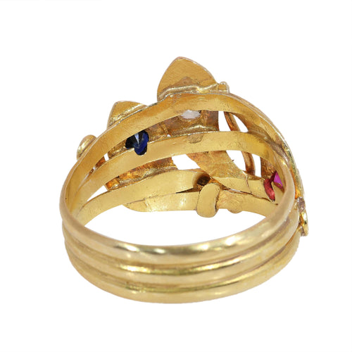 61 Bague triple serpent en or jaune, rubis, saphir et diamant 58 Facettes 26106-0234