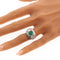 55 Bague en platine avec émeraude et diamants 58 Facettes 26155-0112