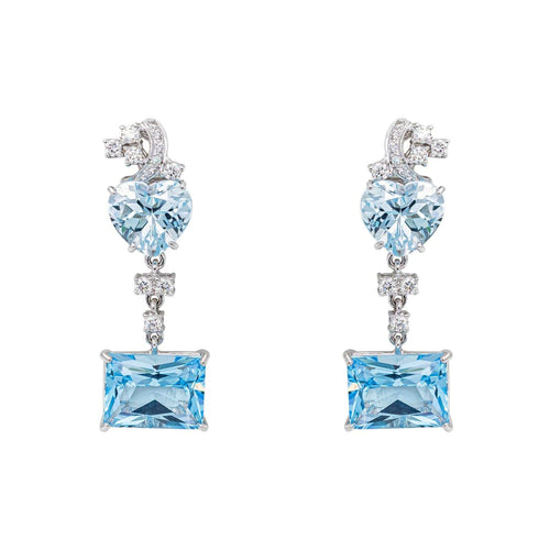 Boucles d'oreilles en or blanc, topazes bleues et diamants 58 Facettes 5867547RV