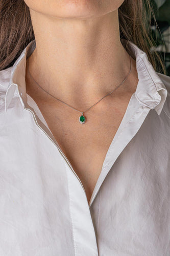Collier pendentif en or blanc, émeraude et diamants 58 Facettes 5943459RV
