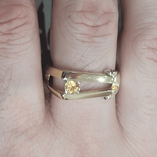 65 Bague en or 18k et saphir orange 58 Facettes S405