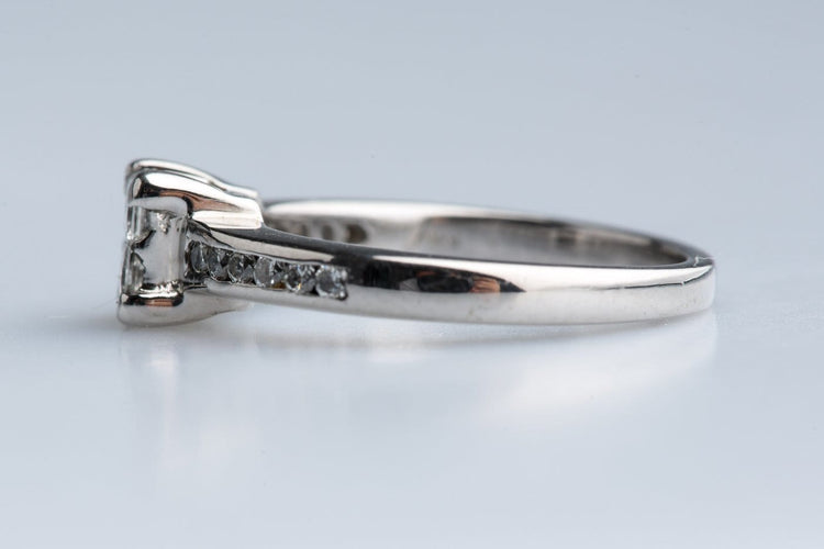 51 Bague diamants princesse et brillants en or blanc 18K 58 Facettes BGMAUBDOC768-107