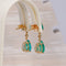 Boucles d'oreilles pendantes en or jaune 14 ct, émeraudes et diamants 58 Facettes E0041