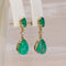 Boucles d'oreilles pendantes en or jaune 14 ct, émeraudes et diamants 58 Facettes E0041