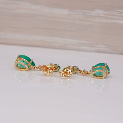 Boucles d'oreilles pendantes en or jaune 14 ct, émeraudes et diamants 58 Facettes E0041