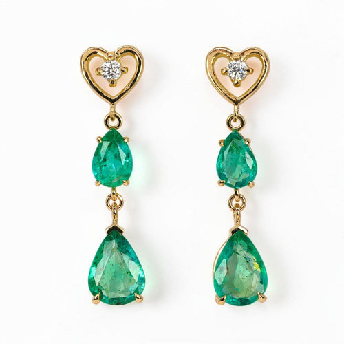 Boucles d'oreilles pendantes en or jaune 14 ct, émeraudes et diamants 58 Facettes E0042
