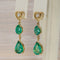 Boucles d'oreilles pendantes en or jaune 14 ct, émeraudes et diamants 58 Facettes E0042