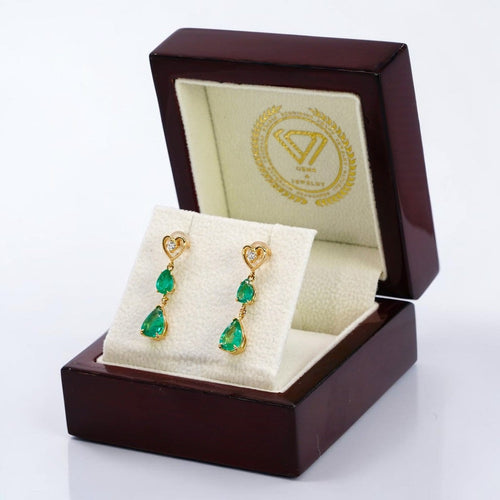 Boucles d'oreilles pendantes en or jaune 14 ct, émeraudes et diamants 58 Facettes E0042