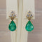 Boucles d'oreilles Boucles d'oreilles pendantes en or jaune 14 ct, émeraudes et diamants 58 Facettes E0043