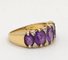 Bague 54 Bague bandeau en or jaune, améthystes et diamants 58 Facettes 239