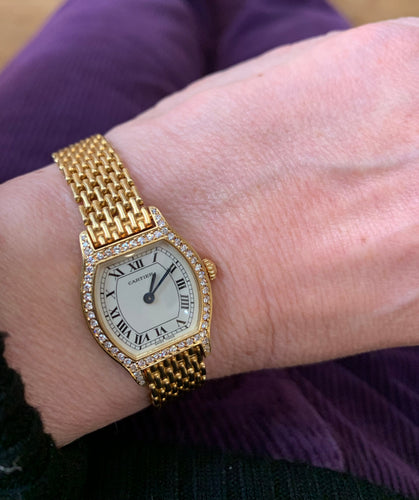 Montre Cartier Tortue - Montre dame en or jaune 18 carats et diamants 58 Facettes M105