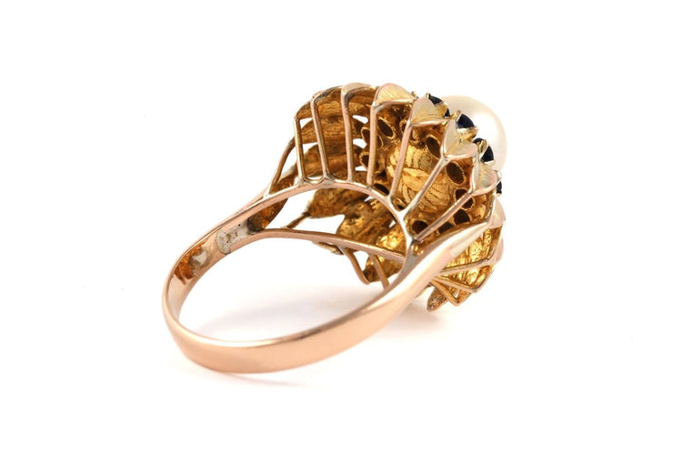 56 Bague années 50 en or jaune, perle et saphirs 58 Facettes 23900
