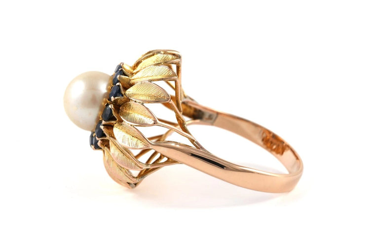 56 Bague années 50 en or jaune, perle et saphirs 58 Facettes 23900