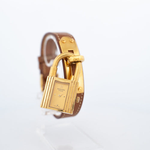 Hermès Kelly - Montre acier plaqué or cadran champagne 58 Facettes 576