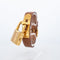 Hermès Kelly - Montre acier plaqué or cadran champagne 58 Facettes 576
