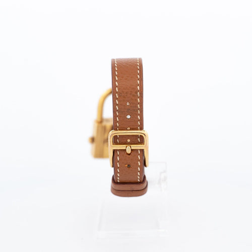 Hermès Kelly - Montre acier plaqué or cadran champagne 58 Facettes 576