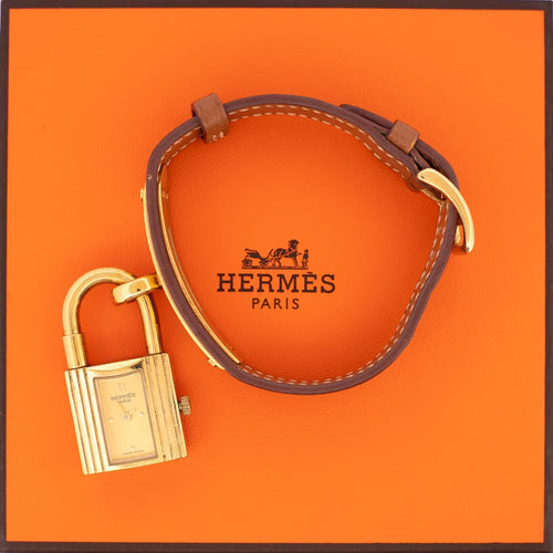 Hermès Kelly - Montre acier plaqué or cadran champagne 58 Facettes 576