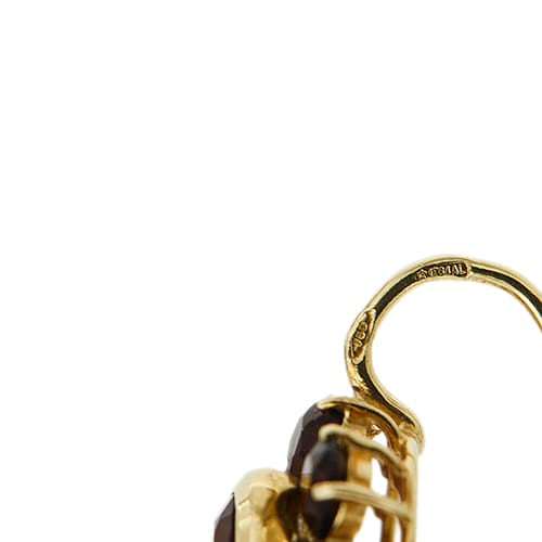 https://ledial.it/app/uploads/2026/08/40300-orecchini-oro-monachella-fiore-granati_14.jpg