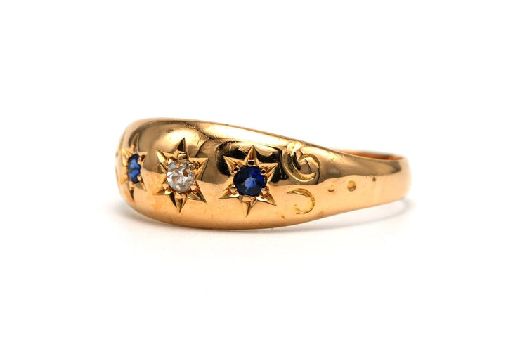 57 Bague Art déco en or jaune 18 ct, diamant et saphirs 58 Facettes B832