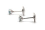 Boucles d'oreilles en or blanc 18 carats et topazes 58 Facettes 24010