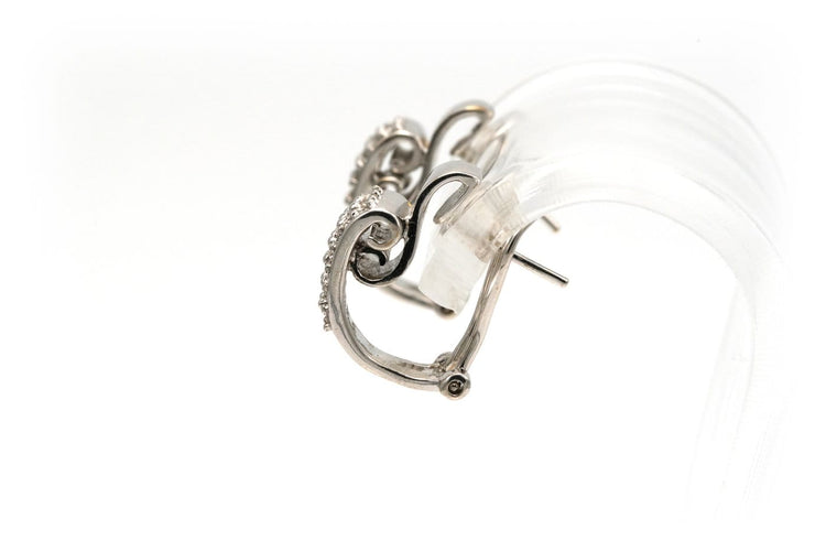 Boucles d'oreilles contemporaines en or blanc et diamants 58 Facettes 18806