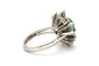 53 Bague contemporaine en or blanc, émeraude et diamants 58 Facettes 23331